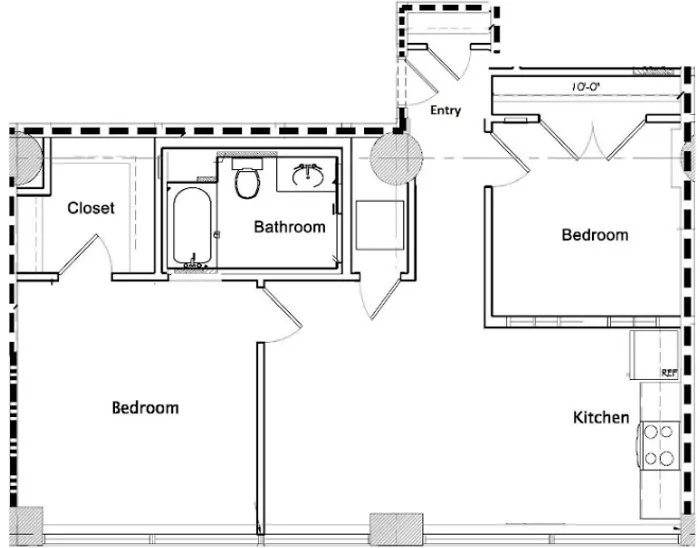 Charming 2-bedroom floor plan showcasing a cozy kitchen, spacious bathroom, and convenient closet space for optimal living.