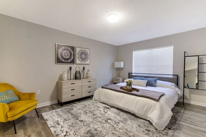 furnished bedroom in apartment home