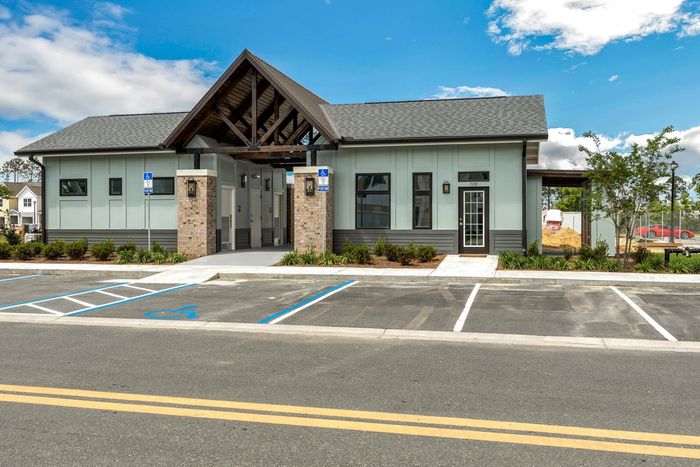 Exterior photo of leasing office in the daytime