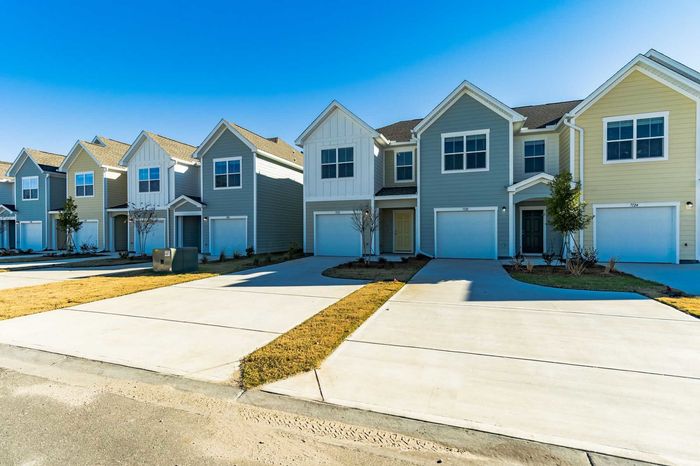 Townhome front exterior on sunny day