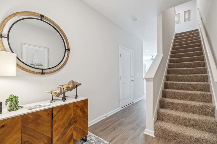 entryway with stairs leading to second floor
