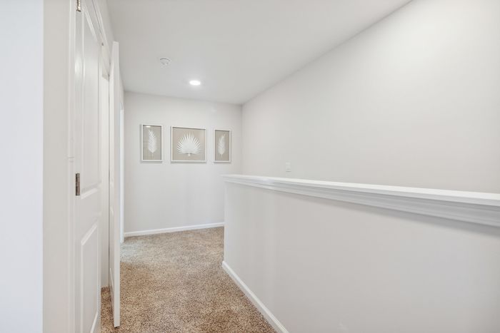 Second Floor landing with carpeting