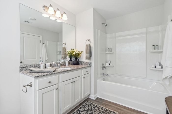 Furnished bathroom with shower