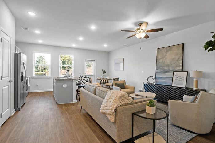 Furnished living room with windows