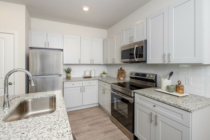 kitchen with white cabinets