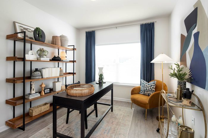 furnished guest room office area