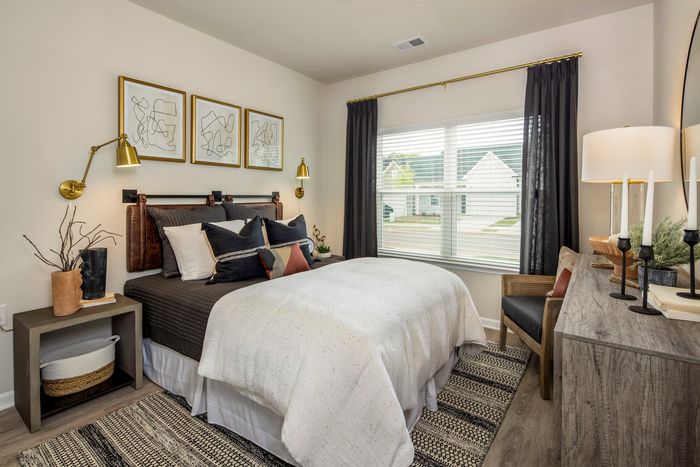 furnished bedroom in single-family home