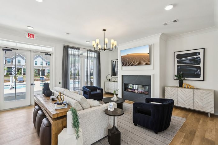 Furnished Clubroom with seating, tv, fireplace