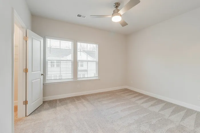 Bedroom with carpet