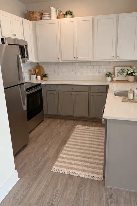 Charming kitchen with stainless steel appliances, elegant cabinetry, and a cozy ambiance, perfect for culinary enthusiasts.