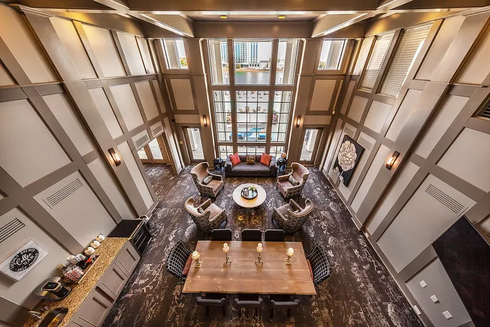 Community Clubhouse with comfortable seating, panoramic windows, and a cozy seating area.