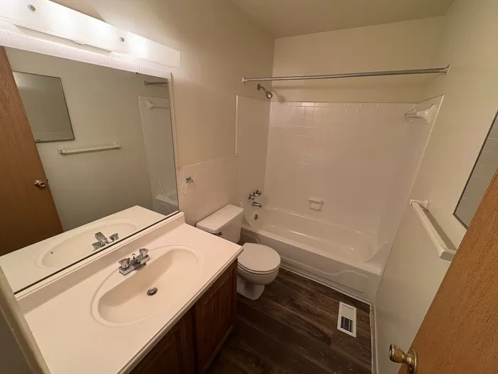 Spacious bathroom at Braeburn Village Apartments.