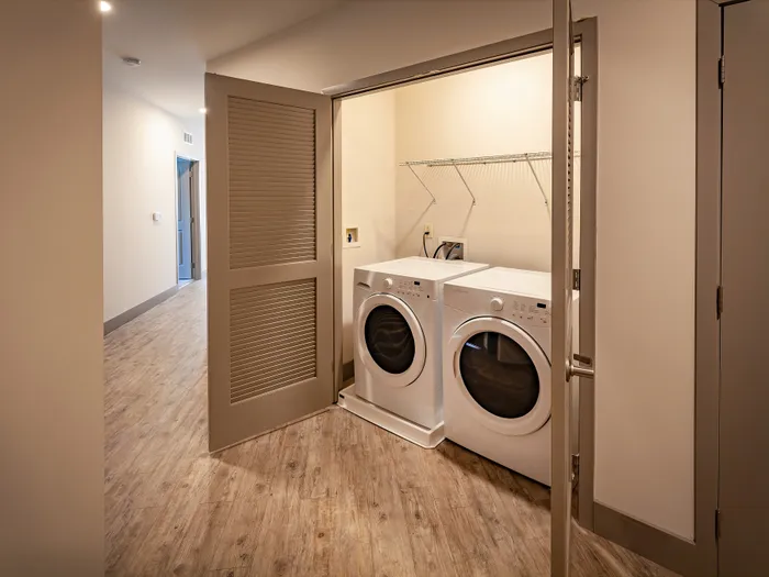 Bright and functional laundry room featuring modern washer and dryer.