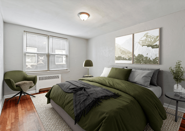 Inviting bedroom with a comfortable bed, stylish decor, and natural light.