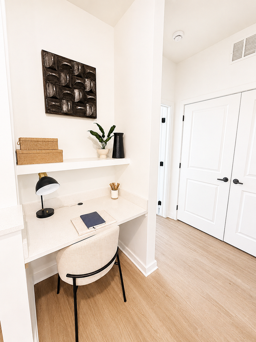 Chic and modern workspace featuring a stylish desk with elegant decor, ideal for productive study or remote work.