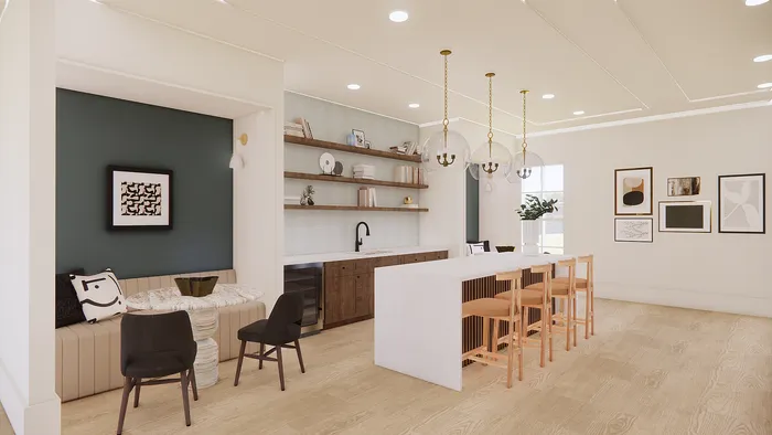 Elegant open-concept dining area with a cozy alcove, featuring a modern wet bar, stylish shelving, and artistic d&eacute;cor.