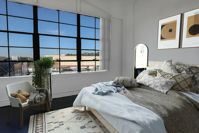 Factory window Bedroom With Tan bedding