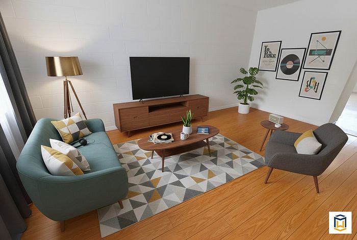 Chic living room with modern furnishings, including a teal sofa, geometric rug, and sleek wooden TV stand, offering a cozy and stylish ambiance.