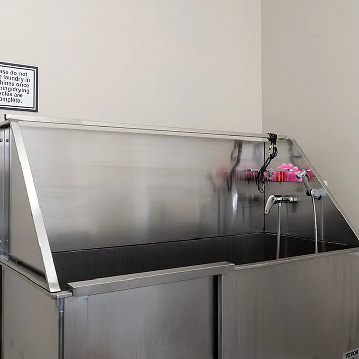 Sleek and hygienic pet washing station with stainless steel finish and practical fixtures.