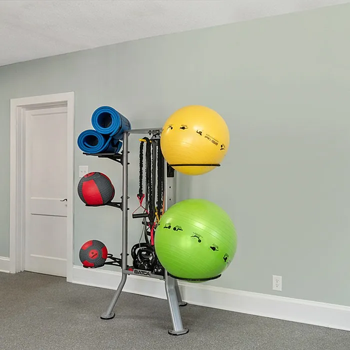 Bright and welcoming home gym corner with vibrant exercise balls, mats, and equipment neatly organized.