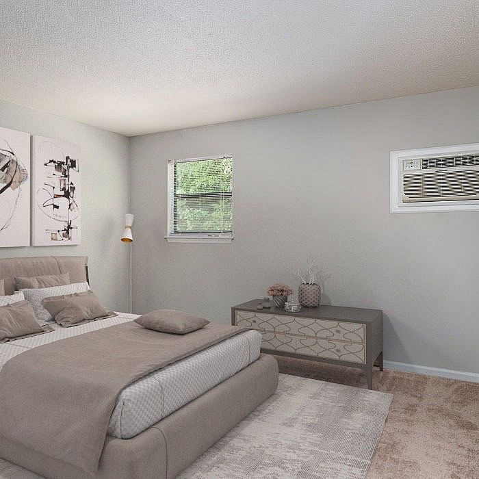 Serene bedroom with elegant decor, featuring a cozy bed, modern nightstand, and natural light from a wide window.