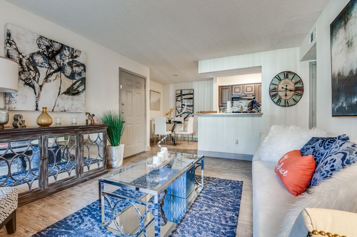 Spacious living area at Preferred Place with natural light and an open layout.