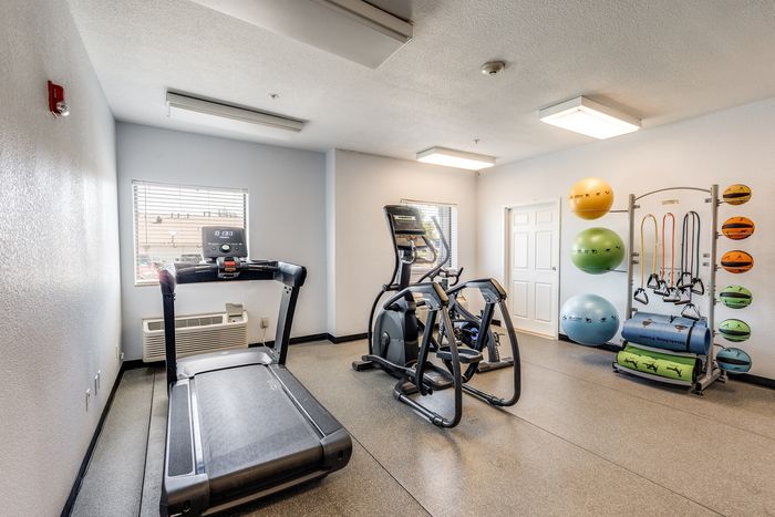 Fitness center at Gruene Pointe in New Braunfels, TX with a treadmill and elliptical