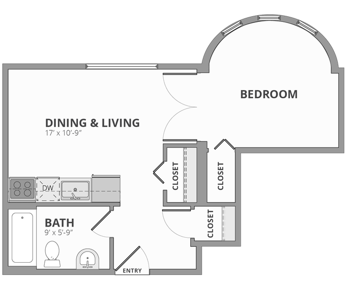 Modern floor plan showcasing a spacious bedroom, open dining and living area, and a well-equipped kitchen with ample closet space.