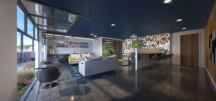 Modern open-concept living area with stylish decor, cozy seating, and large windows offering natural light. Features a chic bar with elegant lighting and a vibrant wall design.