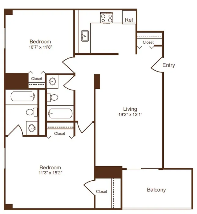 Chic floor plan featuring two spacious bedrooms, two modern bathrooms, open-concept living area, efficient kitchen, and inviting balcony.