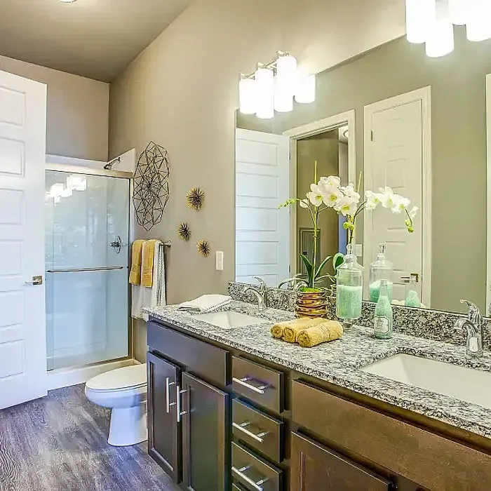 Elegant bathroom featuring dual sinks