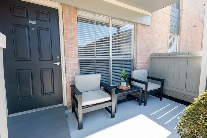 Private patio at Huntington Oaks Apartments in Alvin, TX.