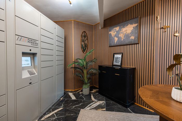 Package locker system for secure resident deliveries at Waterchase Apartments