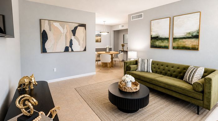 Bright living room interior at Huntington Oaks Apartments in Alvin TX