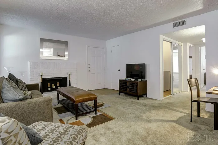 living area arbor creek apartments fireplace