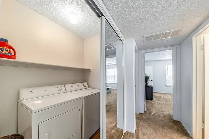 washer and dryer at arbor creel apartments
