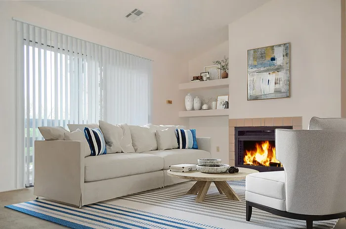 Inviting living room with elegant fireplace, modern decor, and cozy seating, perfect for relaxation and entertaining.