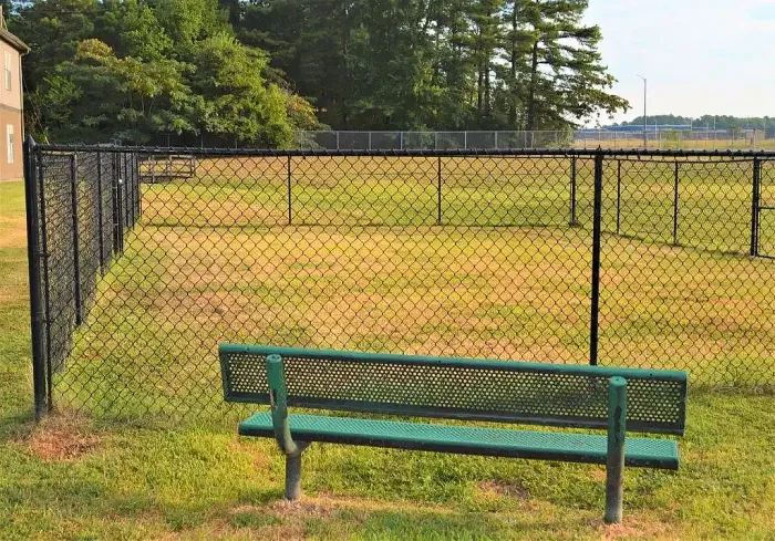outdoor dog park with bench