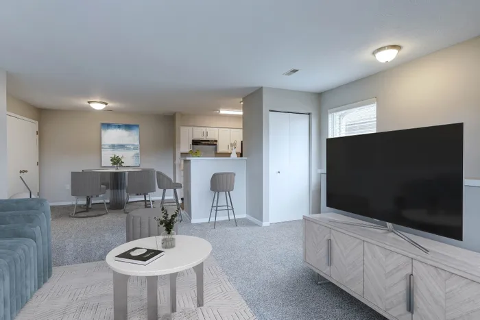 Charming open-concept living space with modern kitchen, stylish dining area, and cozy living room featuring elegant furniture and abundant natural light.