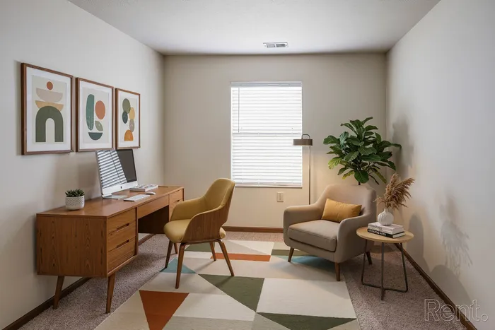 Chic and cozy home office with modern wooden desk, stylish yellow chair, and inviting armchair, enhanced by natural light and vibrant decor.