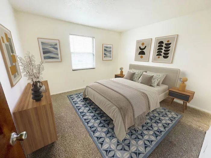 Inviting bedroom showcasing modern decor, plush bedding, and stylish artwork, perfect for a serene retreat.