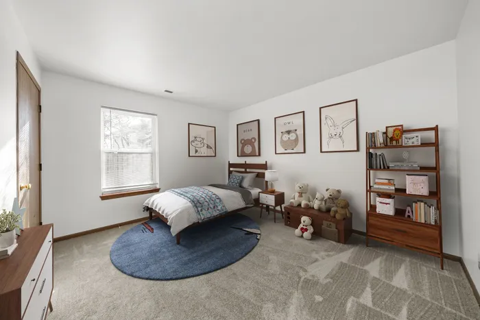 Charming children's bedroom with a cozy bed, playful animal decor, and abundant natural light, perfect for vibrant living.
