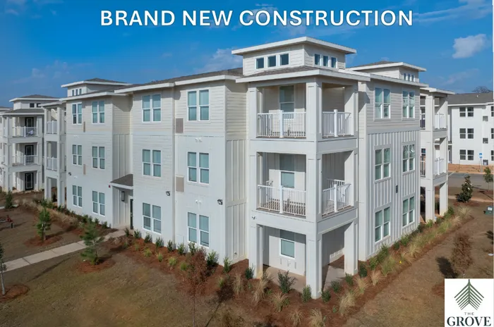Brand new construction showcasing a modern, multi-story apartment complex with elegant balconies and lush landscaping, promoting The Grove community.