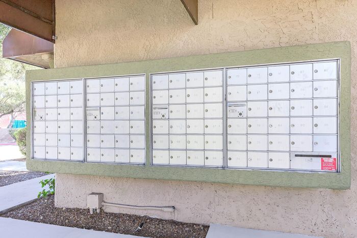Convenient and secure apartment mailbox area with multiple individual mail slots, highlighting community amenities.