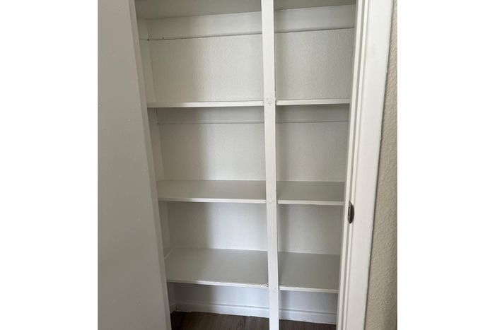 Bright and spacious built-in shelving unit, perfect for organizing and maximizing storage in any room.