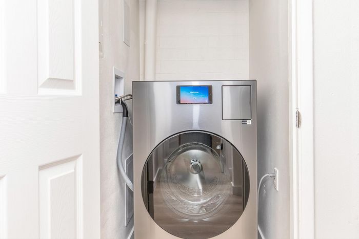 On-site laundry with high-efficiency front-loading washer at Miramonte on 3rd apartments, Tucson