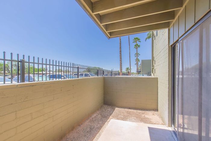 Cozy private patio with sunny views, perfect for relaxation and outdoor enjoyment.