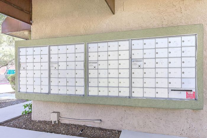 Modern apartment mailboxes with secure and organized design, perfect for convenient package and mail retrieval.