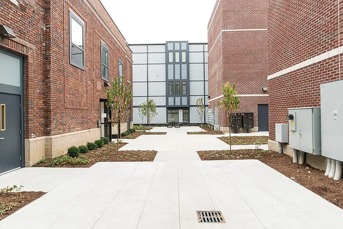 Lawrence Senior - Brick Courtyard