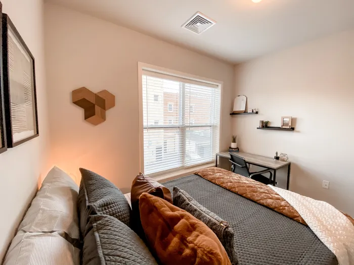 Bedroom with desk Incite at Troy | Student Apartments in Troy, NY